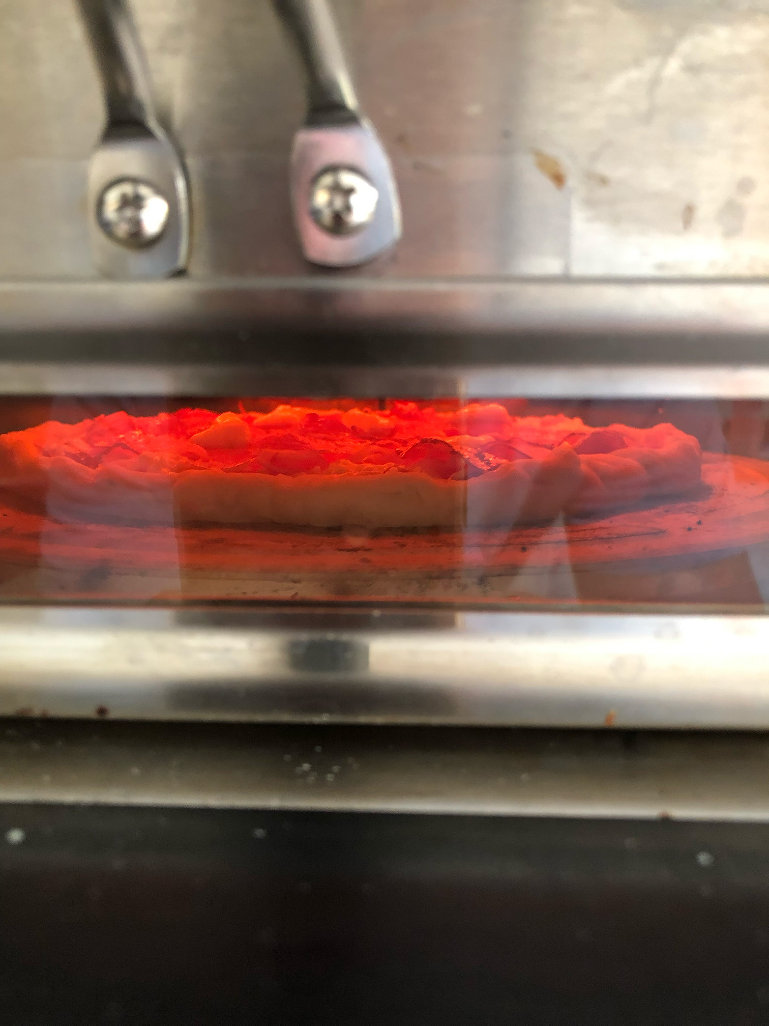 Dekorativbild Pizza i ugnen